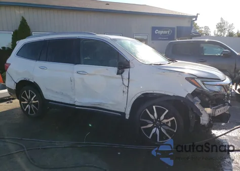2019 Honda Pilot Touring z USA, uszkodzony, nr VIN 5FNYF5H6XKB037214